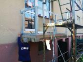 Obrzek - Probíhající práce na rekonstrukci balkónů bytového domu