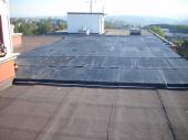 Obrzek - Zateplení střechy panelového domu